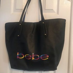Bebe leather tote also comes with separate small zipper pouch